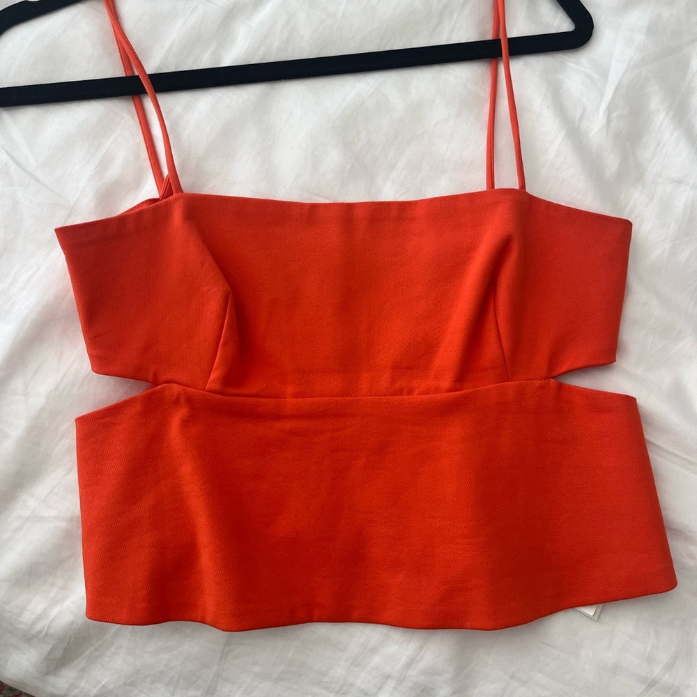 Orange cut out peplum top
